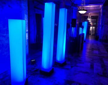 Blue towers light up the event DJ space as NW Wedding DJs plays.