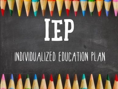 Multiple colored pencils as a background for text IEP individualized education plan