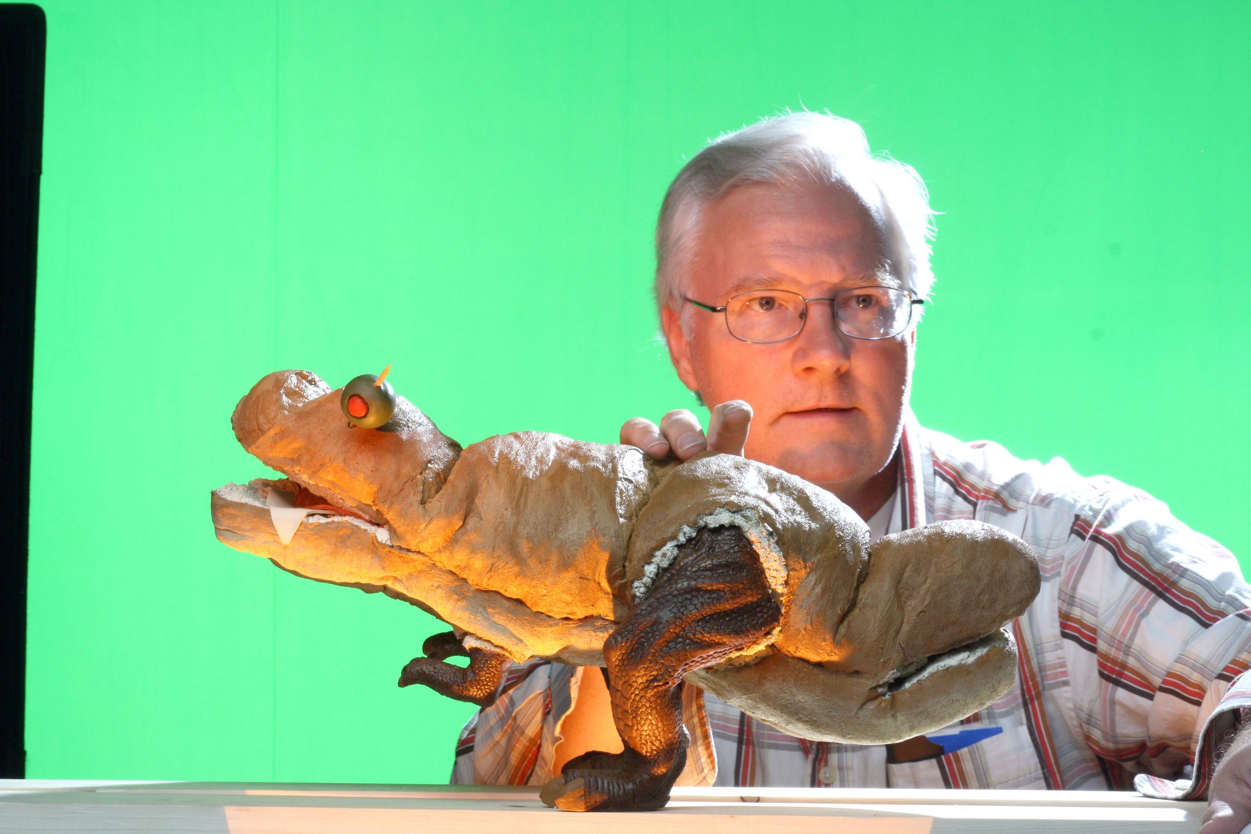 Sawicki adjusts a stop motion puppet for a Togos commercial.
