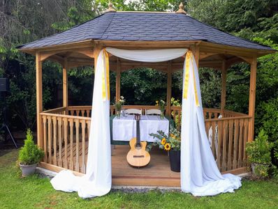 guitar in a summer gazebo haywards heath