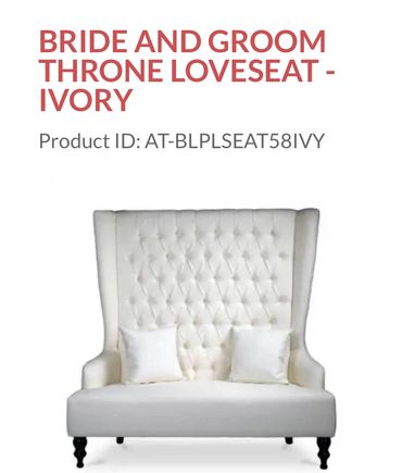 Elegant ivory loveseat with tufted back and winged sides, perfect for bride and groom.