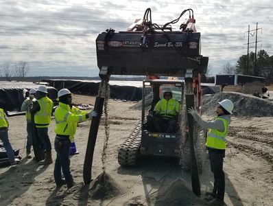 The EZ Spot UR EZ-0013 Speed Bagger filling sand tubes.