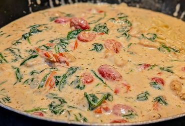 Creamy pasta sauce with spinach and sun-dried tomatoes.