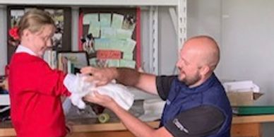 Vet bandaging a child