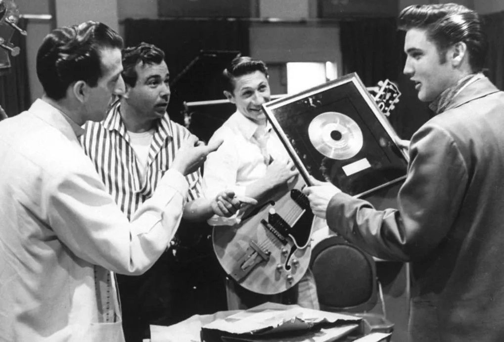 Elvis Presley, Scotty Moore, Bill Black, DJ Fontana, and Gold Record for Heartbreak Hotel.