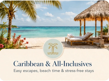 A photo of the beach with white sand, turquoise water and a hut and lounge chairs