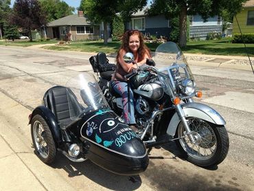 My motorcycle. 2007 Honda Shadow with a Spirit of '76 BMW side car, the side car was given to me by