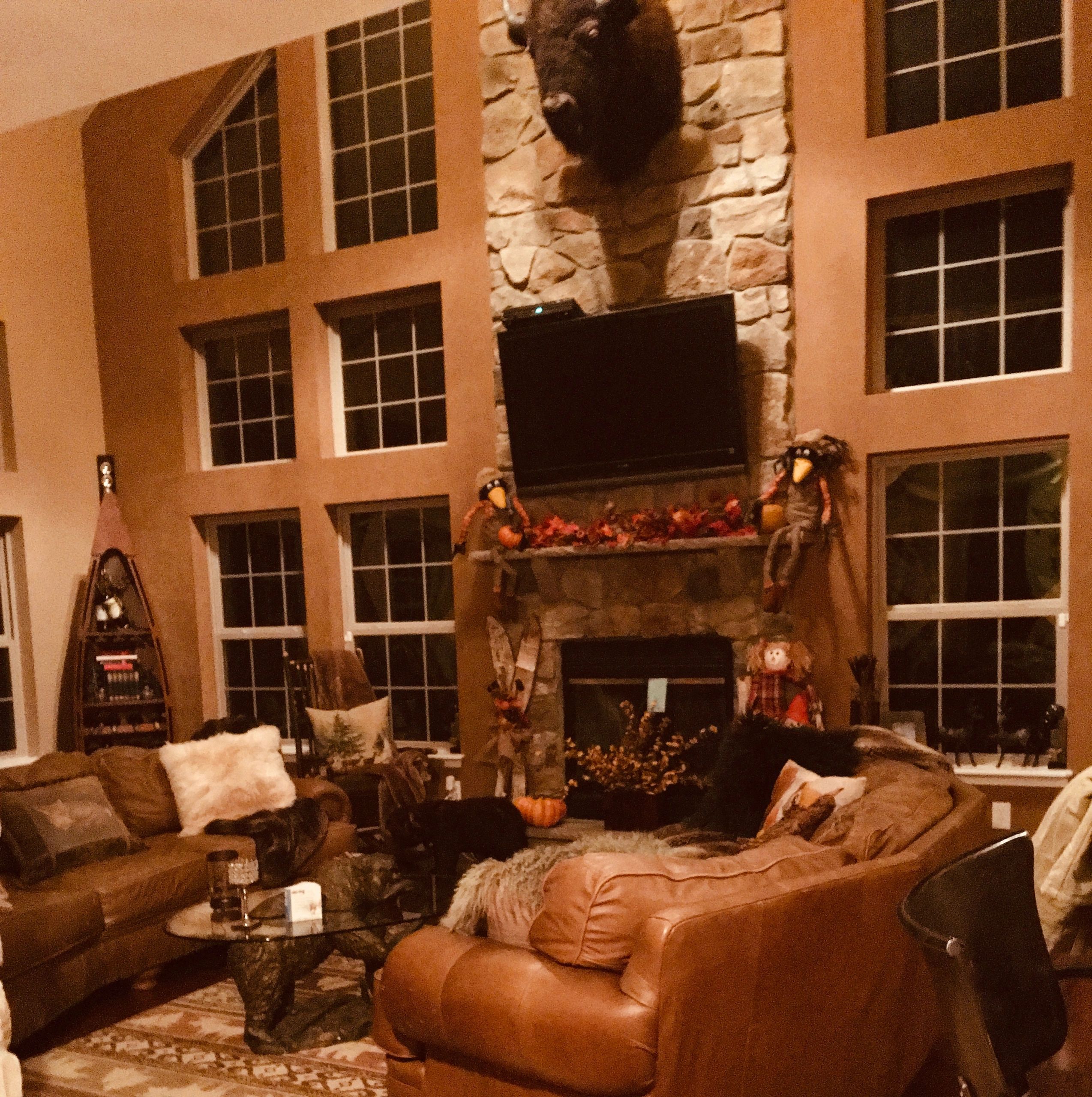 Snuggle up with a glass of wine by the fireplace this great room wraps you up in warmth