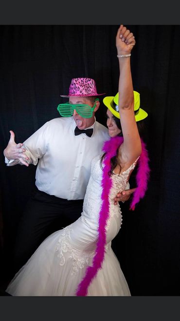 Photo booth fun with wearing props.