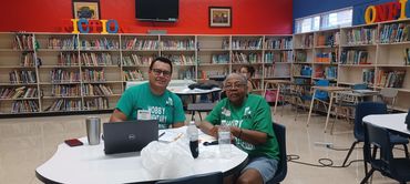 HISD school volunteer and family