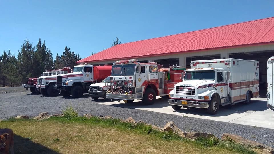 Fire and rescue apparatus parked in front of the fire station
