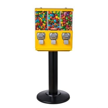 A yellow triple-chamber candy vending machine on a black pedestal.