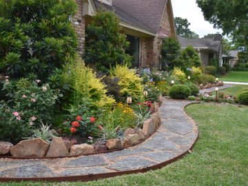 english garden with flagstone walkway for landscape design