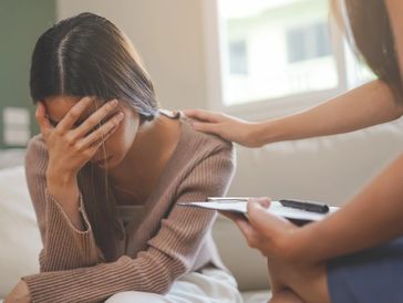 Psychology, sad asian young woman, girl cover face with hand,