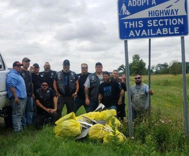 St.Cloud members adopt a highway.