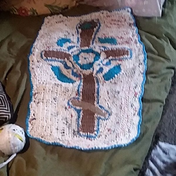Crocheted Wall Hanging of the Eastern Orthodox Cross, from disposed plastic bags, turned to thread.