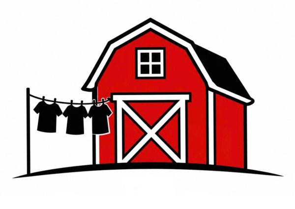 Red barn with clothes hanging on a line.