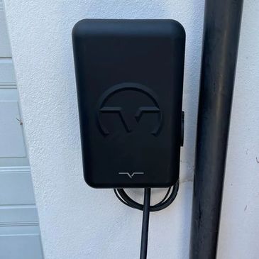 Vchrgd EV charger installed on wall