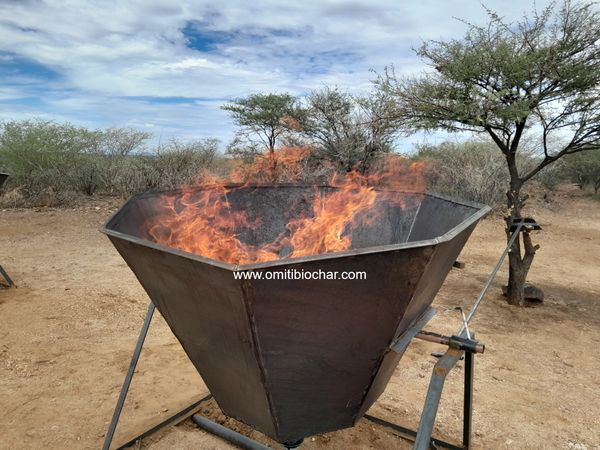 Bush to Biochar with Kon-tiki kilns in Namibia. © Omiti Biochar