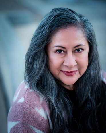 A middle aged Native American actress