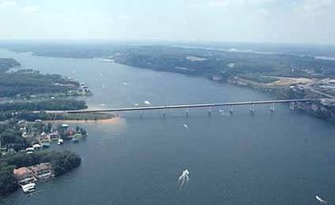 An aerial view of the lake and bridge