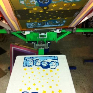 A tea towel on our press, printed for the Hardly Strictly Bluegrass festival 