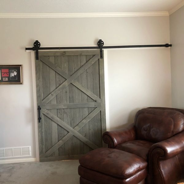 Entertainment room barn door