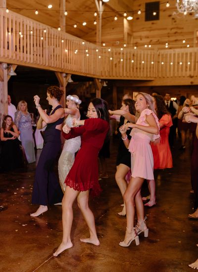 women dancing on a dance floor at a wedding