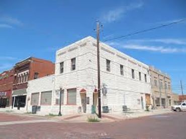 Electra City hall and downtown street. Coffee shop business and stores. ctwc