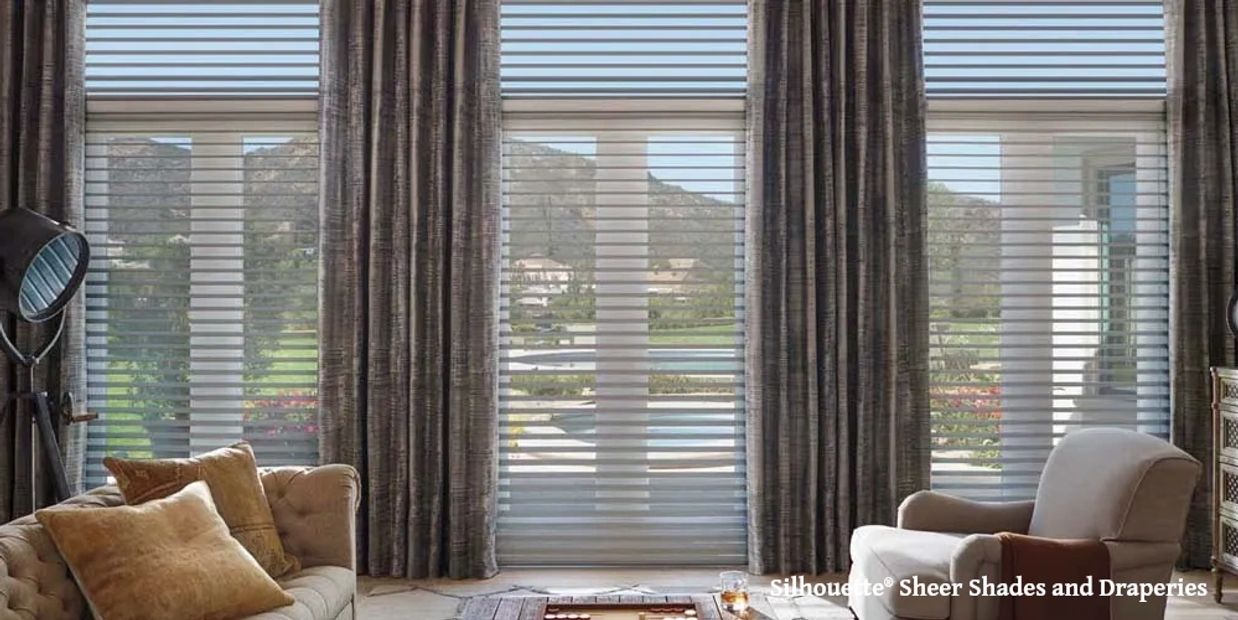 Silhouette® Sheer Shades with Custom Draperies in the Family Room.