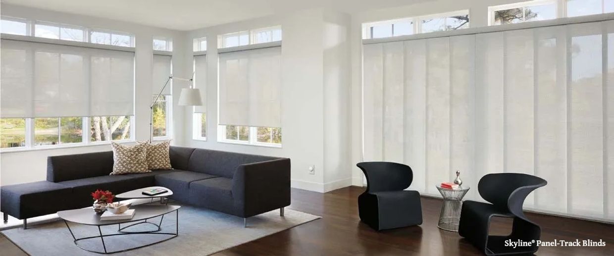 Skyline® Panel-Track Blinds in the living room.