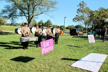 a group of people at an event playing drums