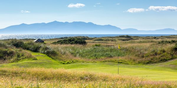 Western Gailes Golf Club with the Isle of Arran in the background