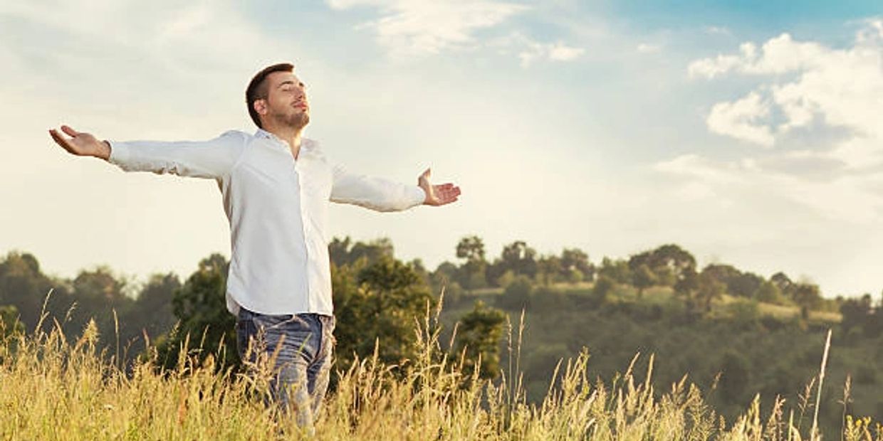 Photo of a client feeling free and empowered.