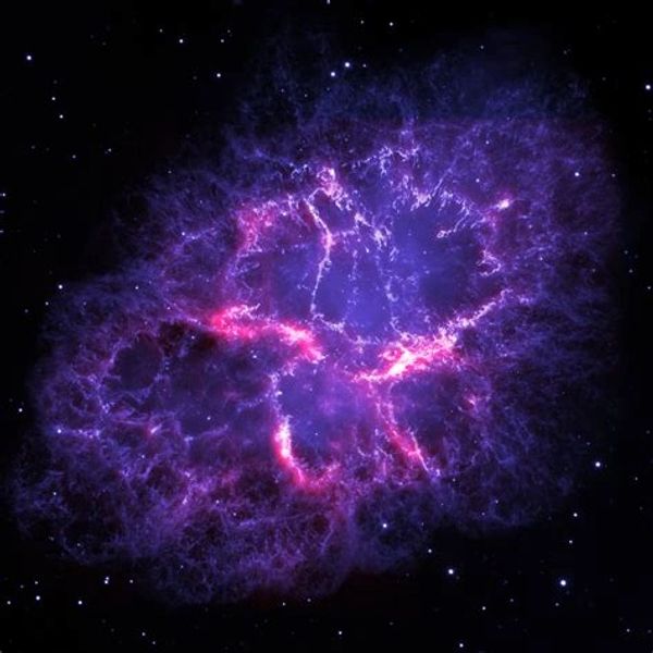 A composite image of the Crab Nebula, combining data from the Herschel and Hubble space telescopes.