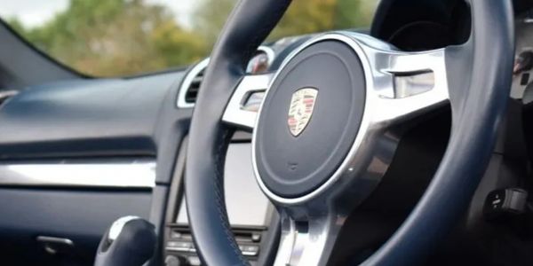 Interior view of a Porsche steering wheel.
