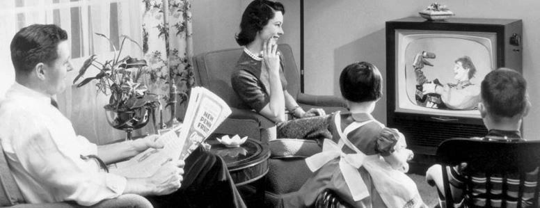 Vintage picture of a family watching TV