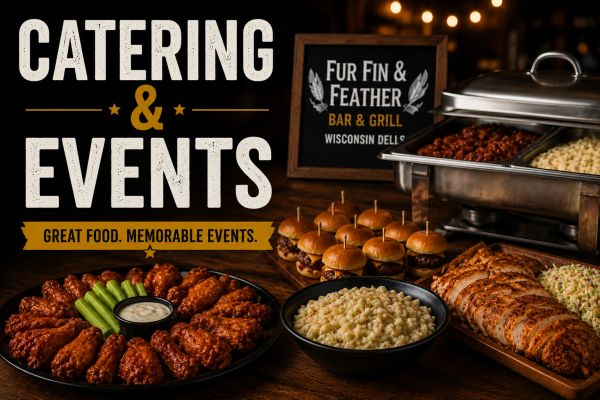 Catering spread with wings, sliders, mac and cheese, and more for events.