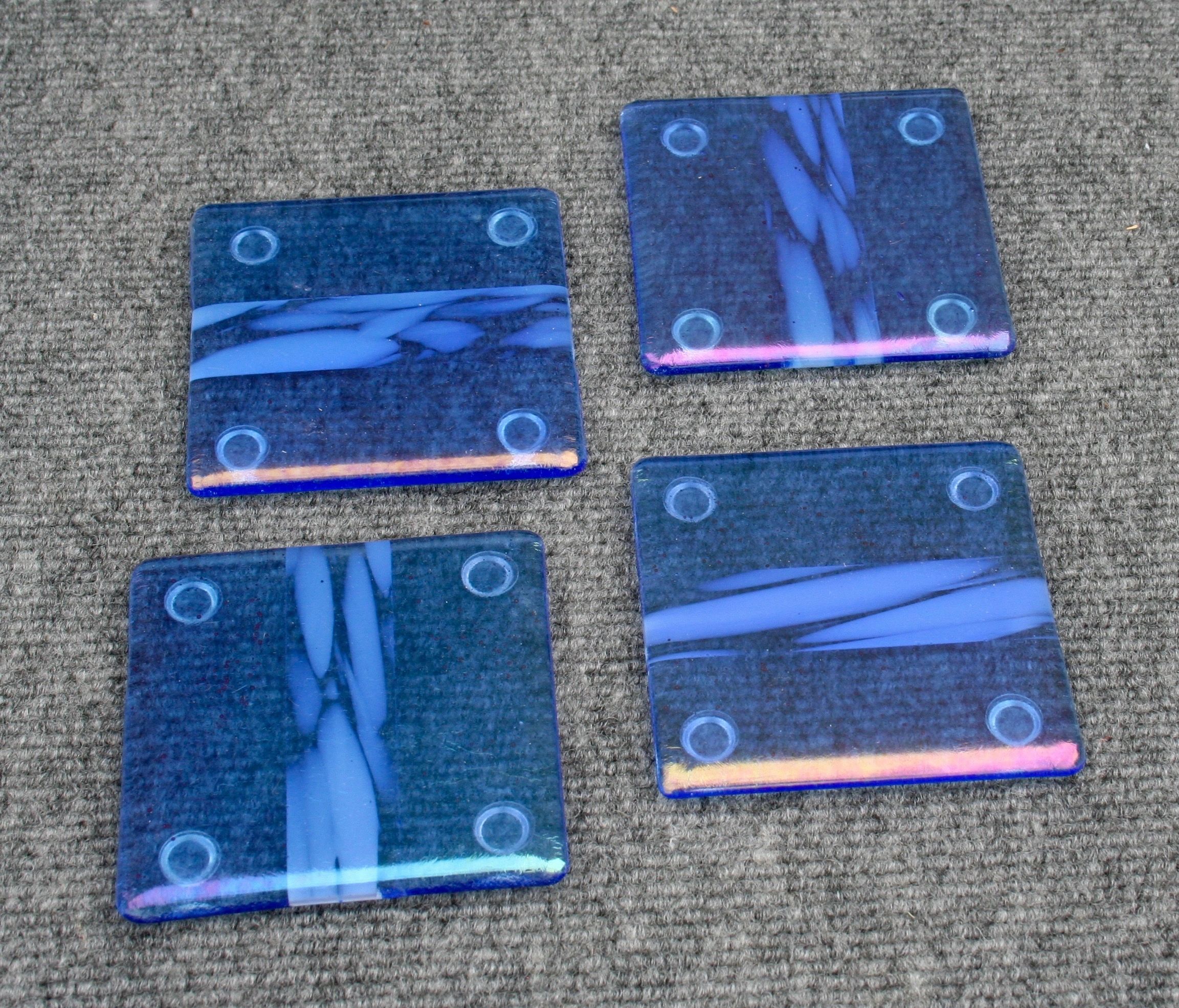 Glass Coasters in many different colors and designs