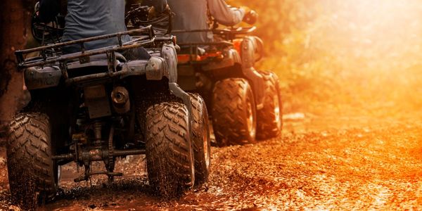 People ATV'ing on trails in Monroe County.