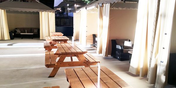 Private cabanas with picnic tables