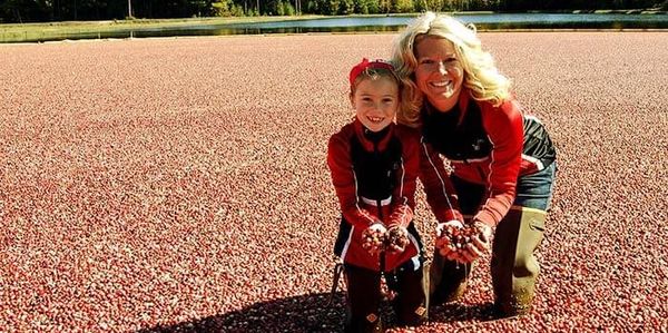 Mom and daughter in Cranberry bog in Warrens, WI