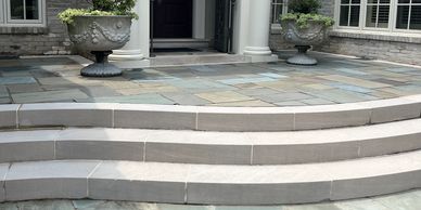 This is a limestone front porch that was soft washed
