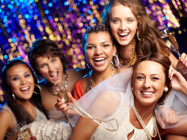 Group shot of young women celebrating their friend's upcoming wedding