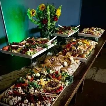 Long table of food selections.
