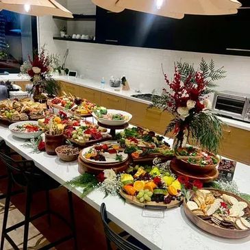 Platter of varied appetizers on counter.