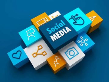 Colorful cubes with social media icons and 'Social Media' text on a blue background.