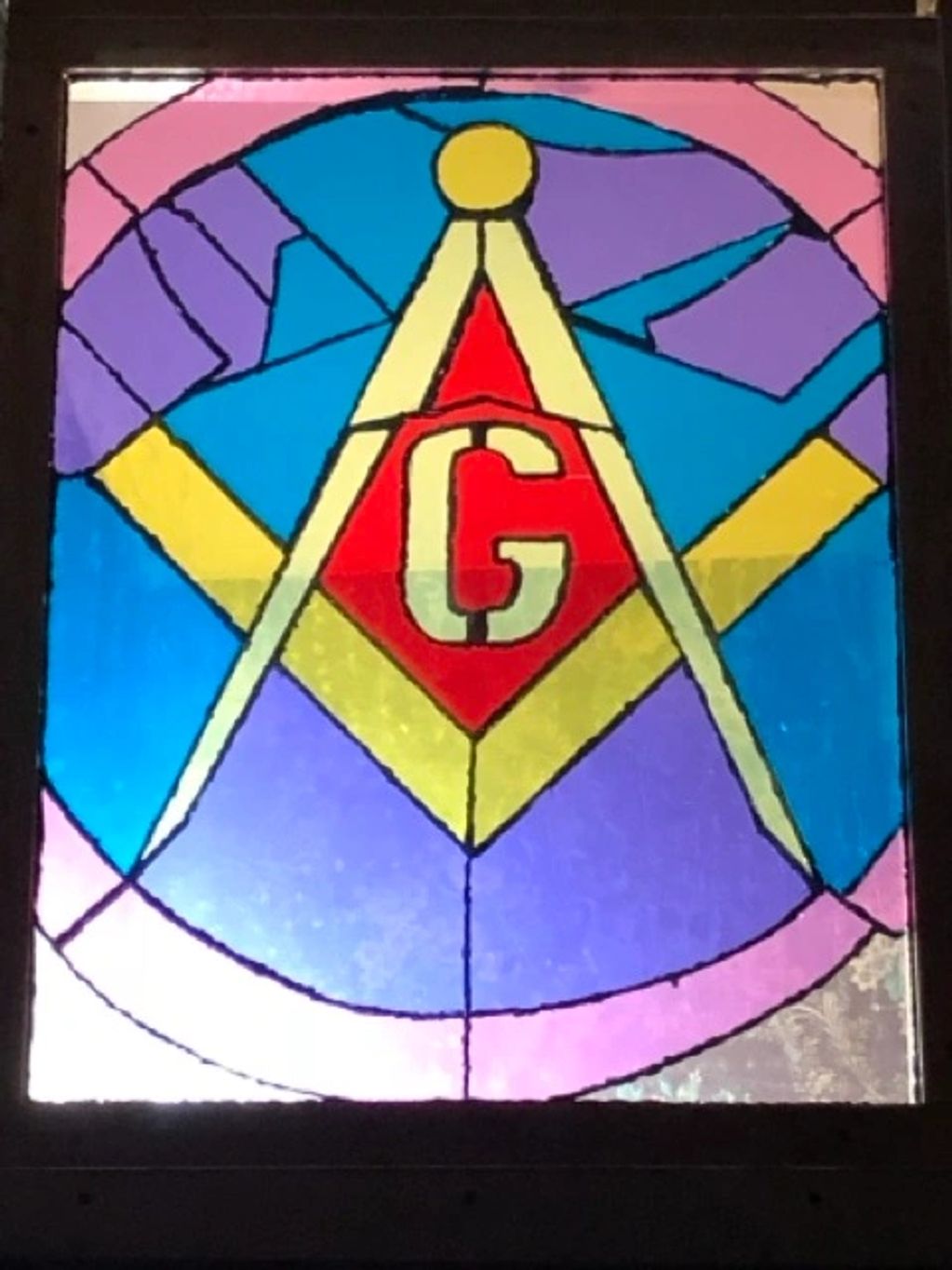 Faux stained glass Freemason piece.