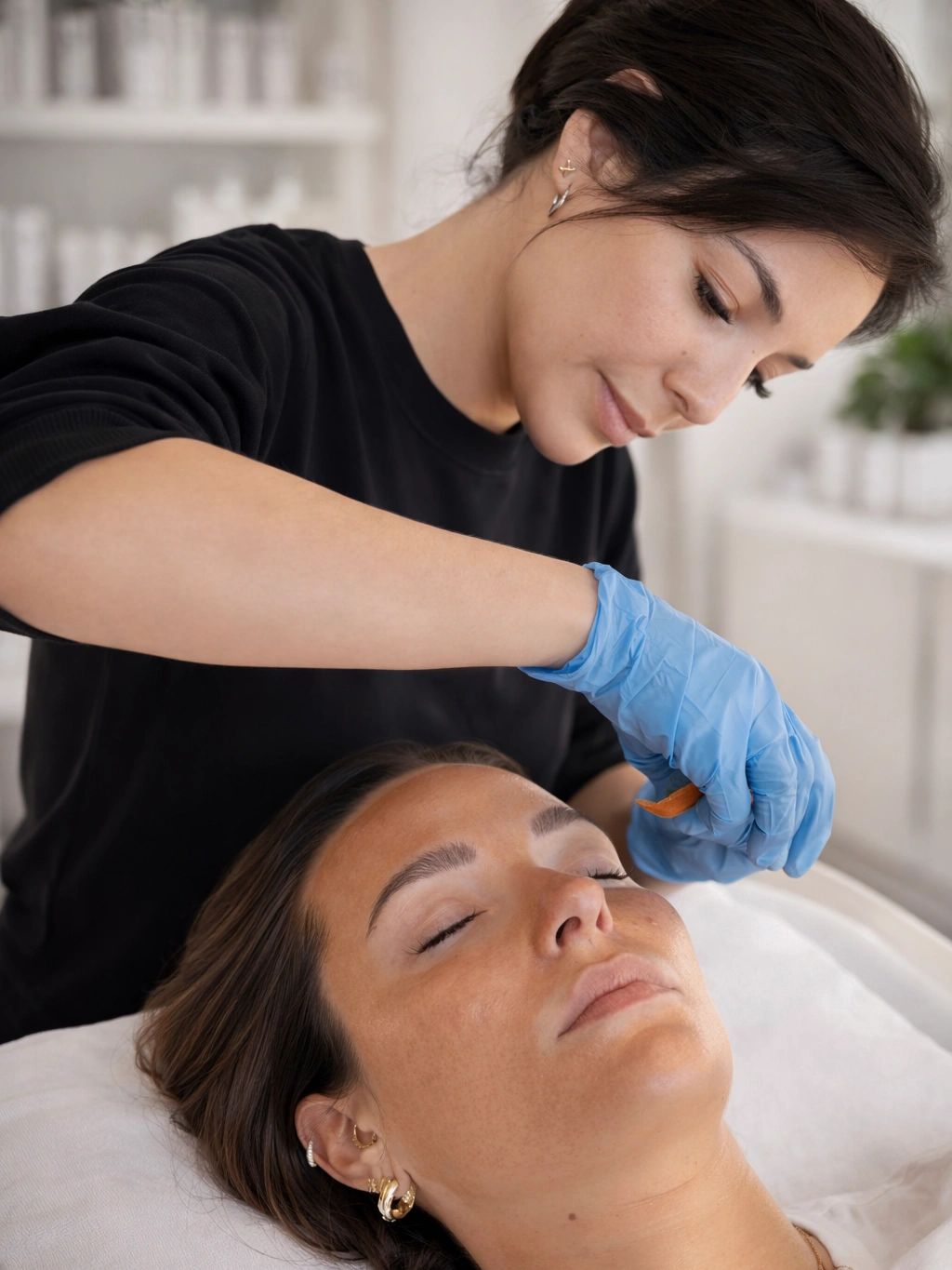 Provider applying a professional chemical peel treatment to a client at Ever Vita Aesthetic in Wayne, NJ.