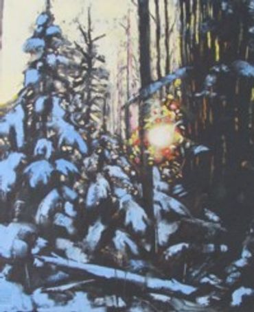 Sunset through snow covered trees